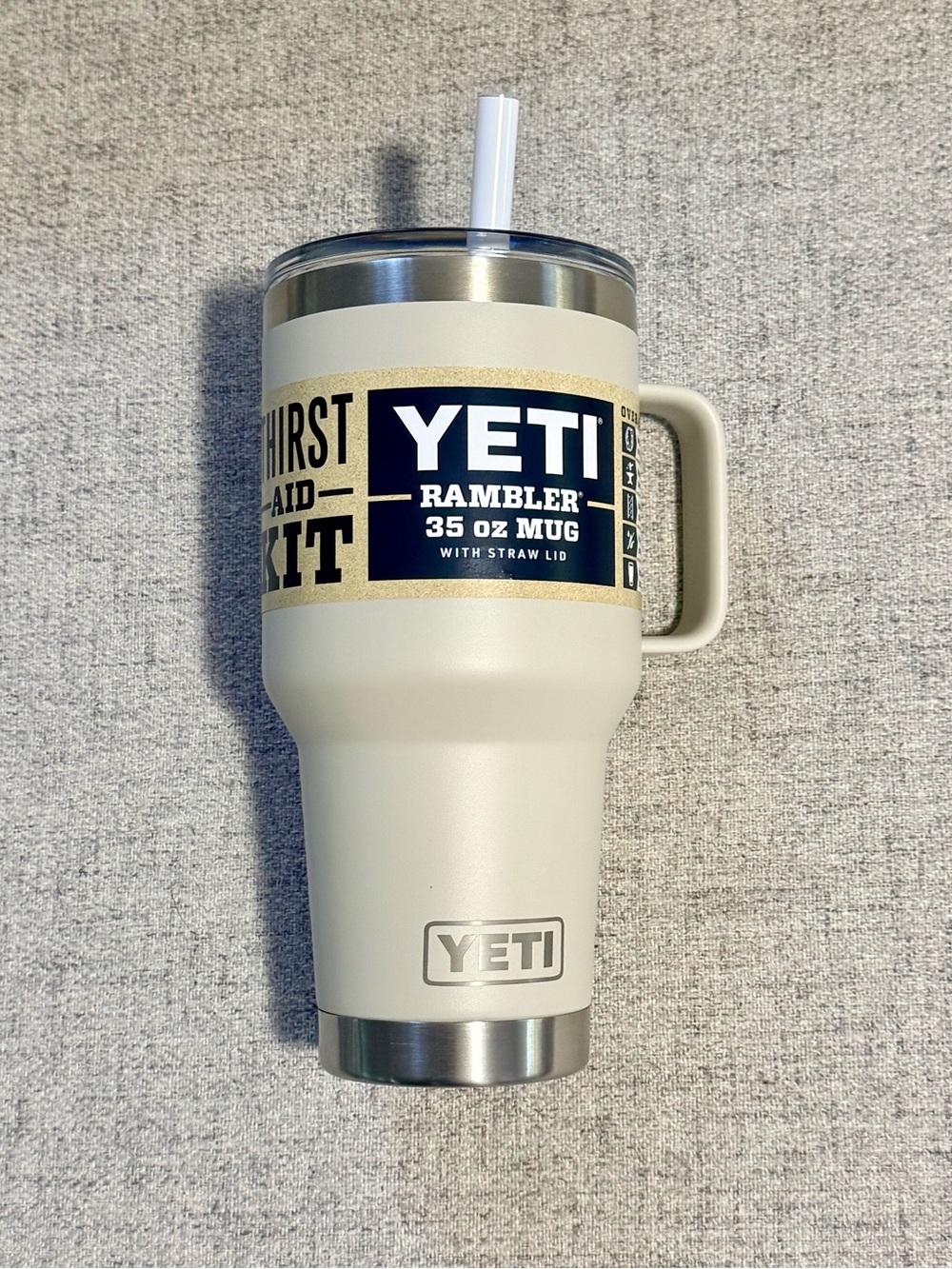 Yeti Cream Rambler 35 oz Mug with Handle and Straw Lid
